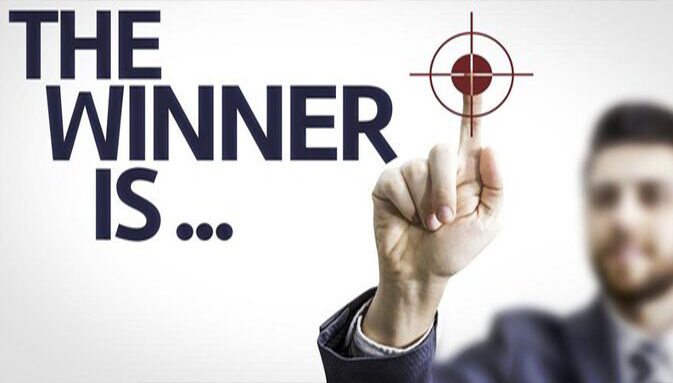 pointing at the winner