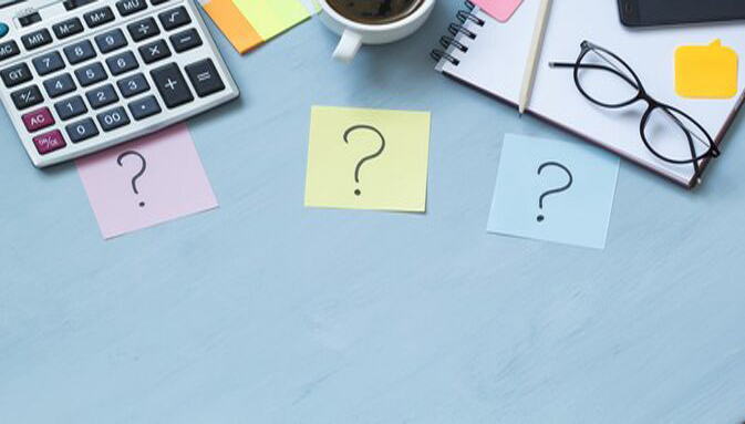 three question marks written on post-it notes